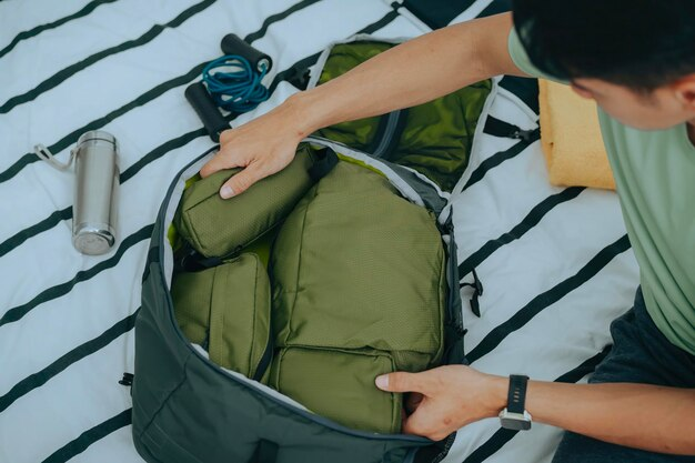 male traveler packing